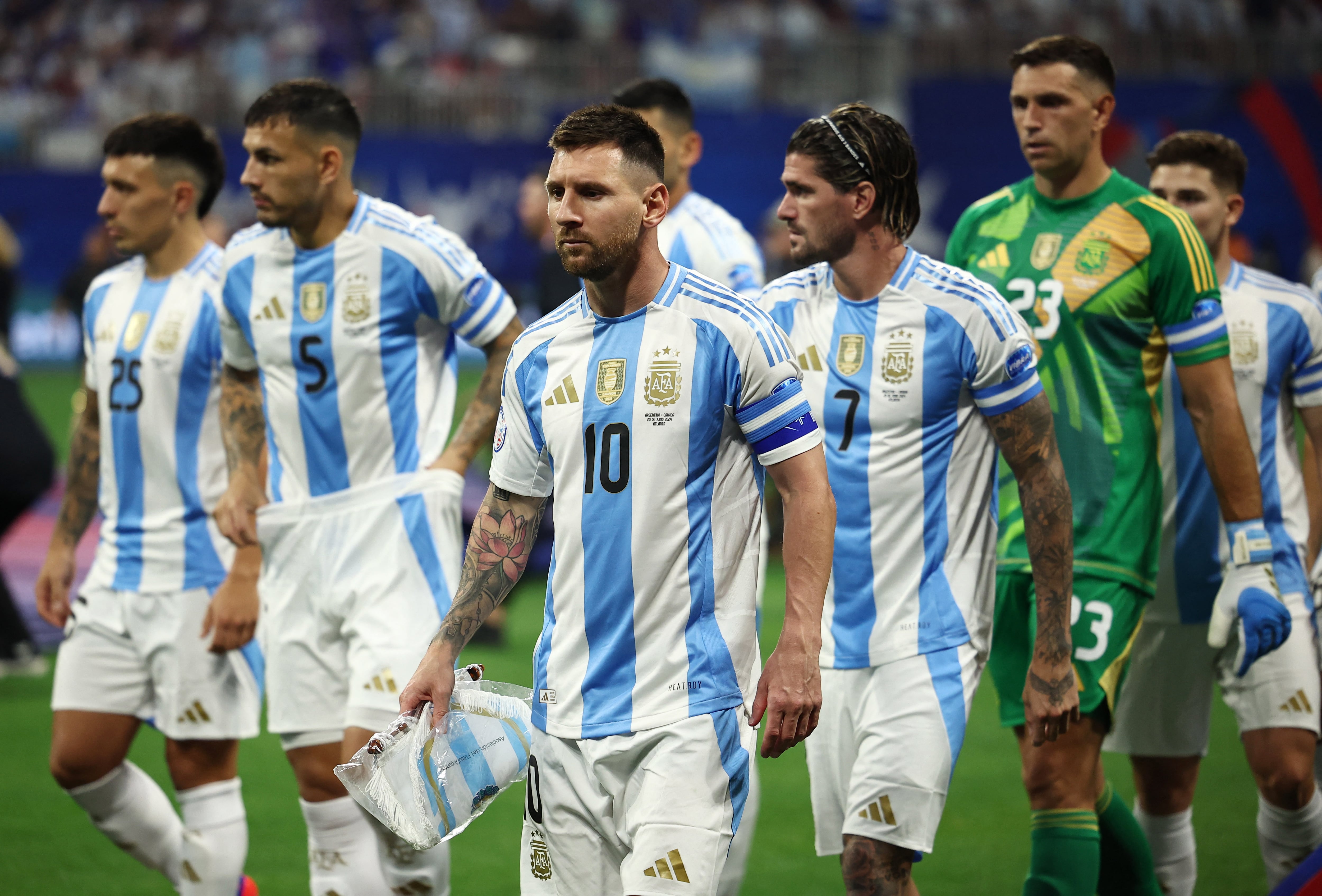 Soccer Football - Copa America 2024 - Group A - Argentina v Canada - Mercedes-Benz Stadium, Atlanta, Georgia, United States - June 20, 2024 Argentina's Lionel Messi walks out before the match REUTERS/Agustin Marcarian