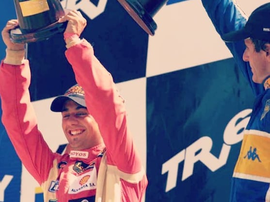 En un podio del Top Race en 2005 junto a Ernesto "Tito" Bessone (Claudio Kohler)