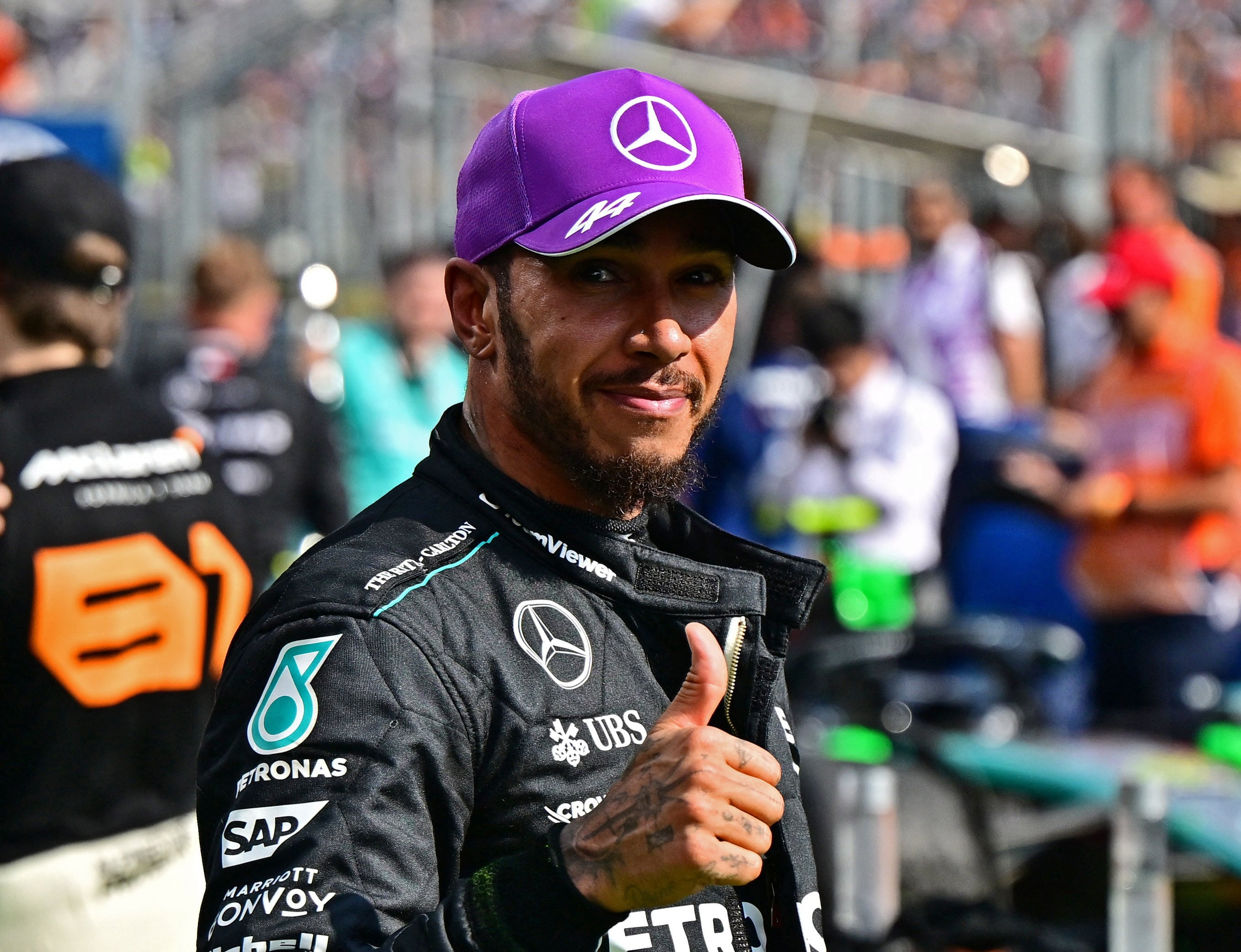 Formula One F1 - Hungarian Grand Prix - Hungaroring, Budapest, Hungary - July 21, 2024 Mercedes' Lewis Hamilton celebrates after finishing third place in the Hungarian Grand Prix REUTERS/Marton Monus