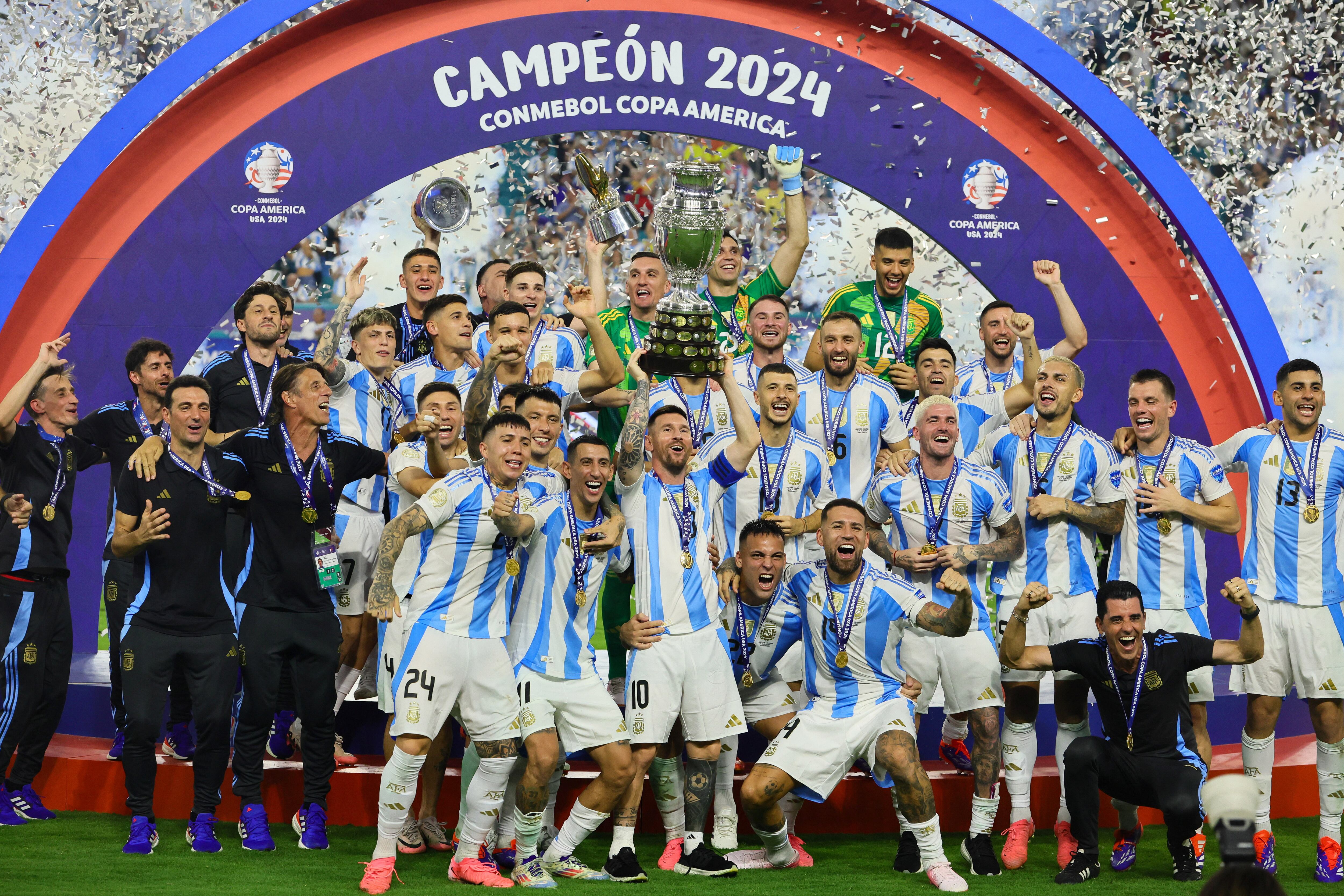 Jul 14, 2024; Miami, FL, USA; Argentina forward Lionel Messi (10) and teammates celebrate after winning the Copa America final against Colombia at Hard Rock Stadium. Mandatory Credit: Sam Navarro-USA TODAY Sports