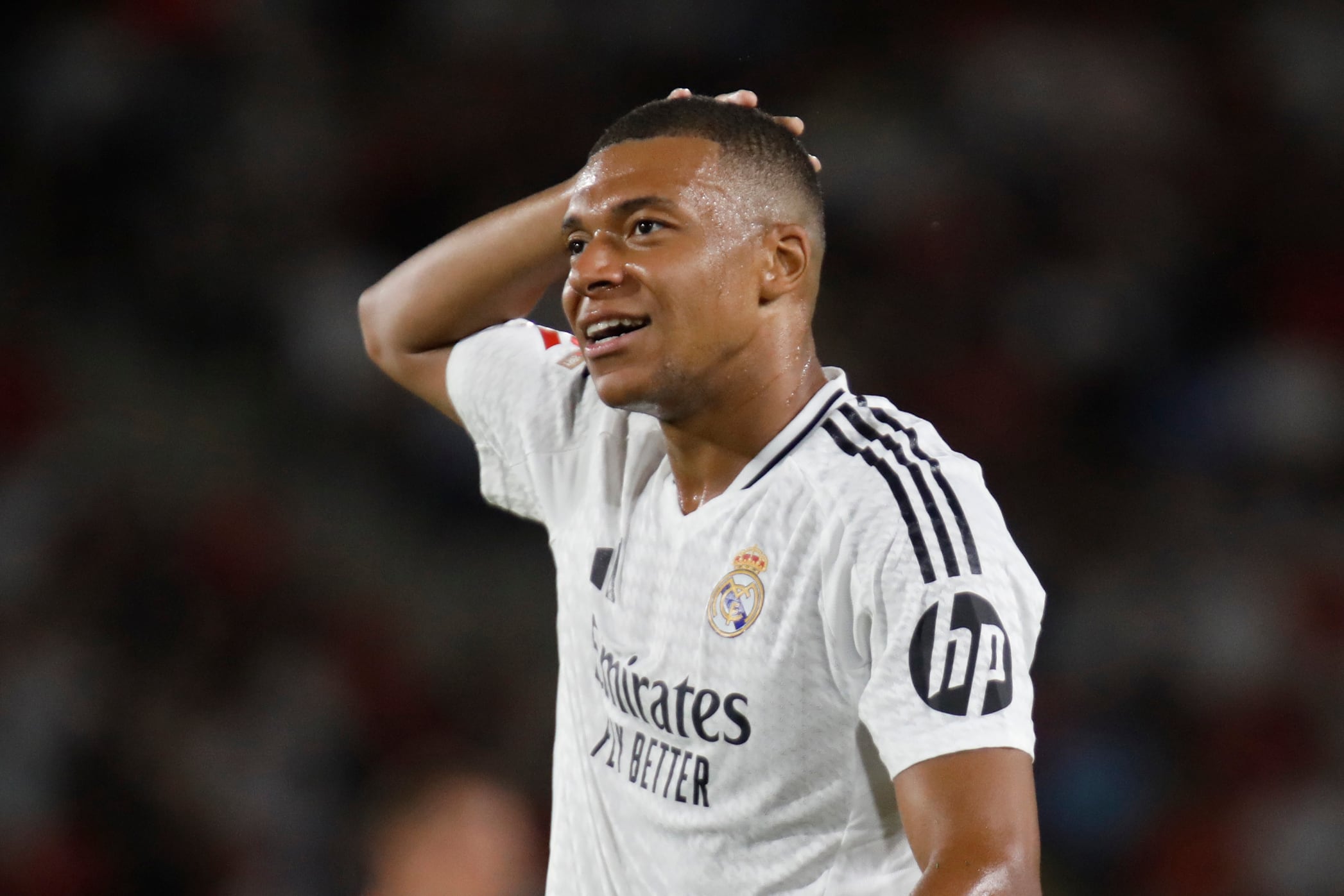 Kylian Mbappé del Real Madrid reacciona en el encuentro ante el Mallorca en la liga española el domingo 18 de agosto del 2024. (AP Foto/Francisco Ubilla)