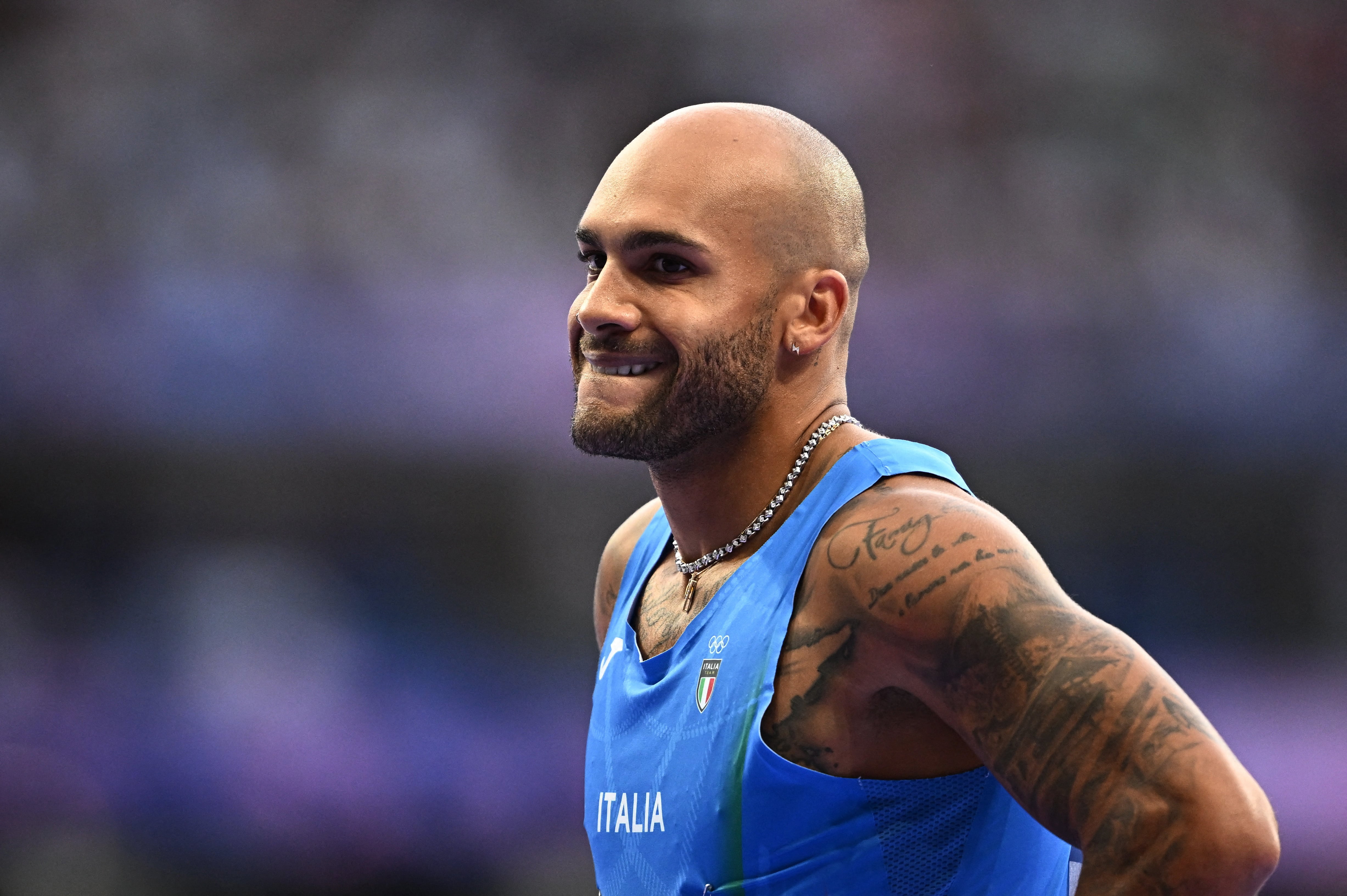 París 2024 Juegos Olímpicos - Atletismo - Semifinal masculina de 100m 2 - Stade de France, Saint-Denis, Francia - 4 de agosto de 2024. Lamont Marcell Jacobs de Italia reacciona después de terminar la semifinal 2 en tercer lugar REUTERS/Dylan Martinez