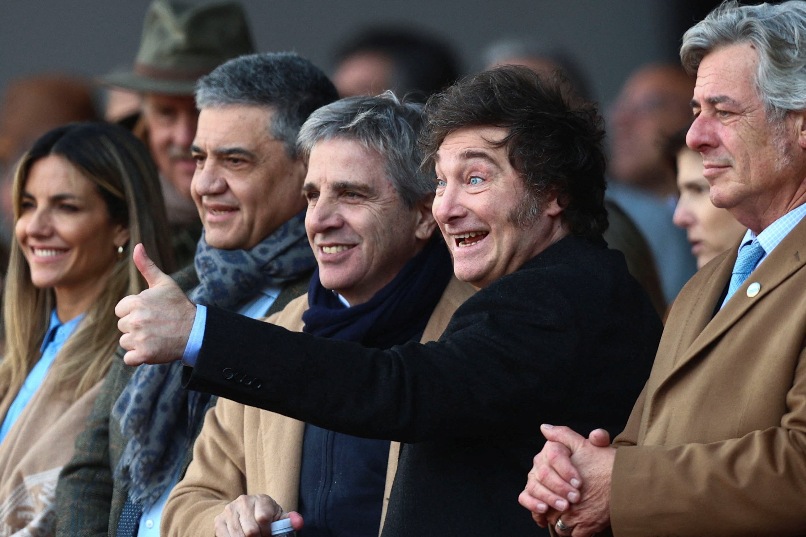 Jorge Macri junto a Luis Caputo y el presidente Javier Milei semanas atrás en La Rural (REUTERS/Matias Baglietto)