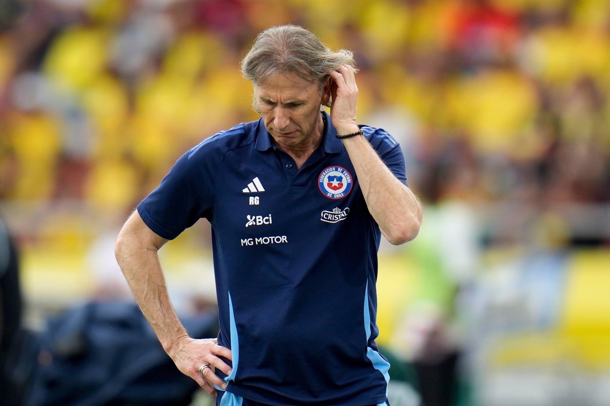 Chile's coach Ricardo Gareca gestures during a FIFA World Cup 2026 qualifying soccer match against Colombia at the Metropolitano Roberto Melendez stadium in Barranquilla, Colombia, Tuesday, Oct. 15, 2024. (AP Photo/Fernando Vergara)