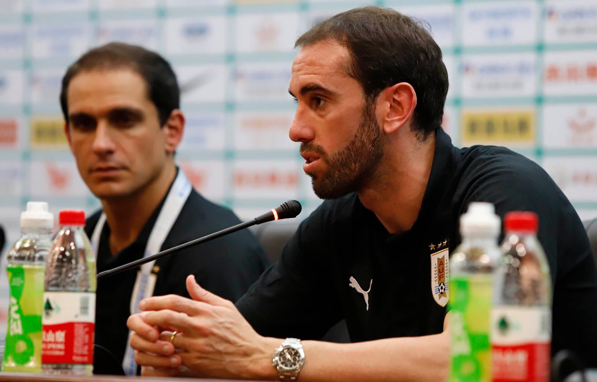 Matías Faral y Diego Godín