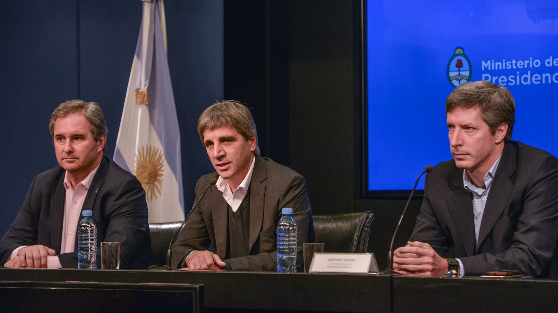 Pablo Quirno, Luis Caputo y Santiago Bausili 