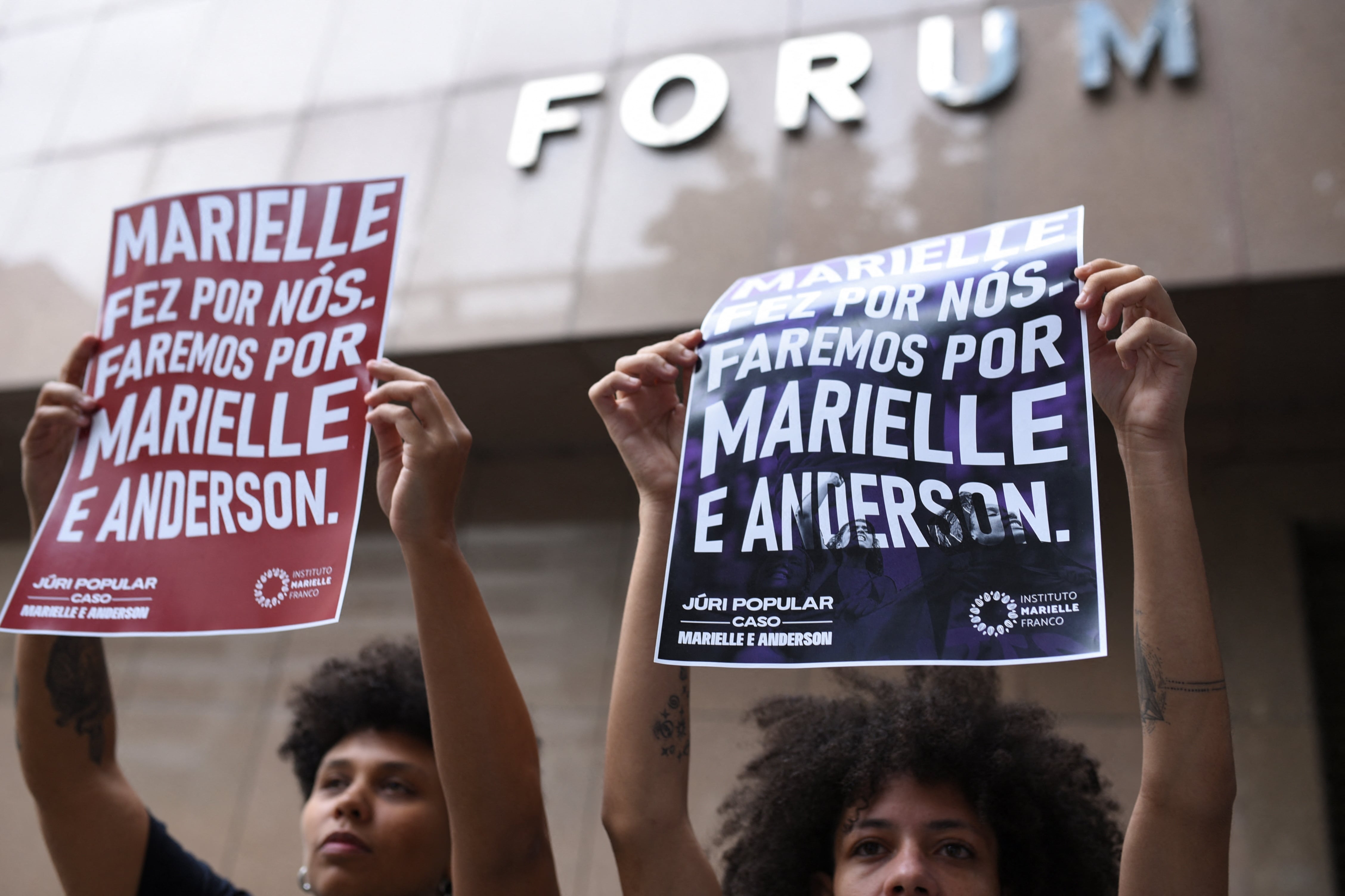 Supporters hold posters at the trial for the murder of activist and Rio de Janeiro councilwoman Marielle Franco, in Rio de Janeiro, Brazil October 30, 2024. REUTERS/Tita Barros