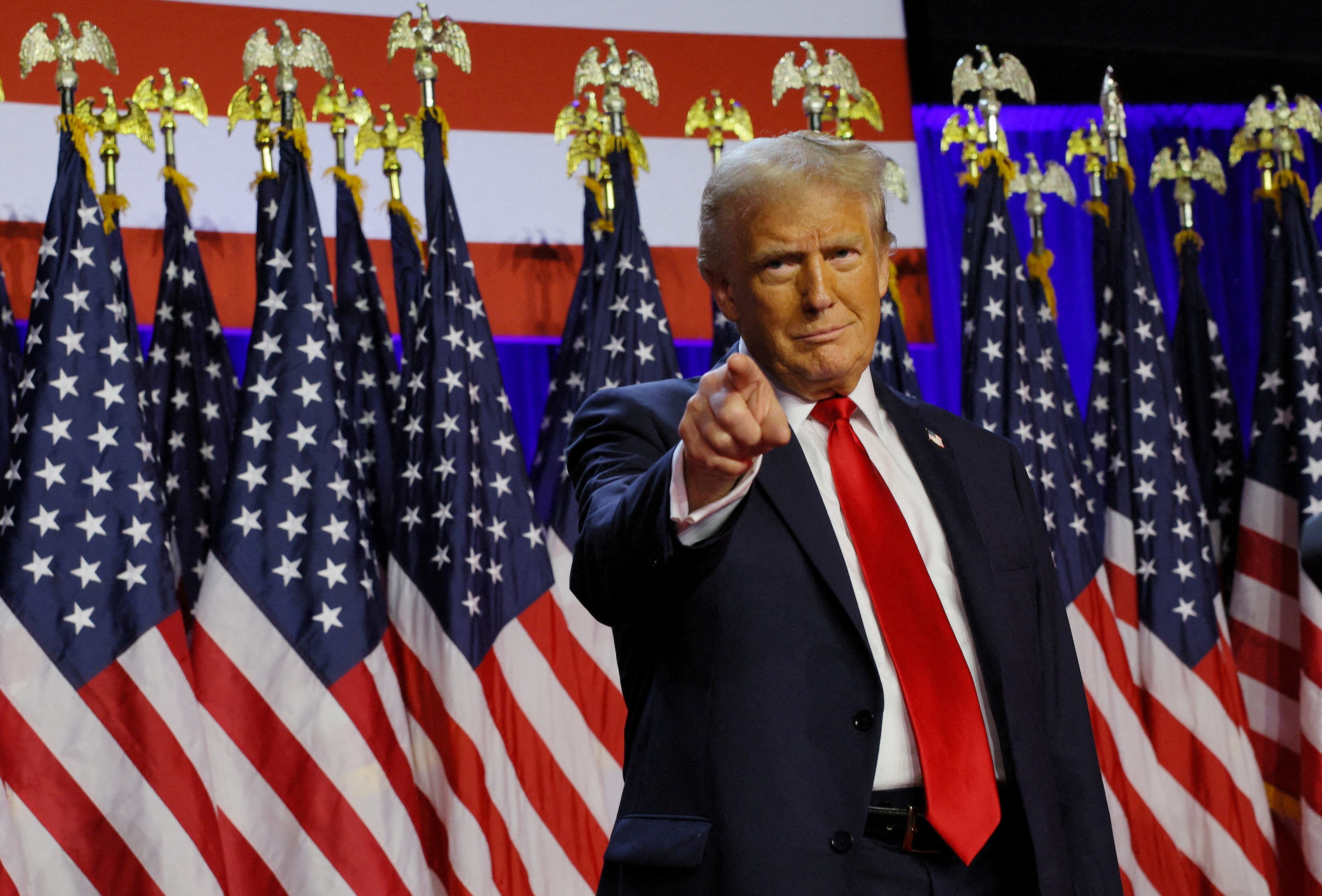 Republican presidential nominee and former U.S. President Donald Trump takes the stage to address supporters at his rally, at the Palm Beach County Convention Center in West Palm Beach, Florida, U.S., November 6, 2024. REUTERS/Brian Snyder